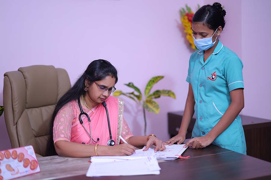 Dr. Ananthi Aravind Consulting the patient